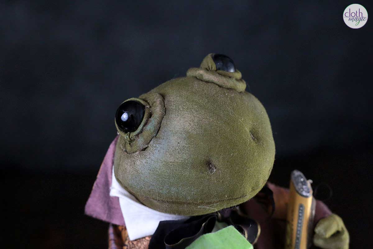 courting frog doll face detail